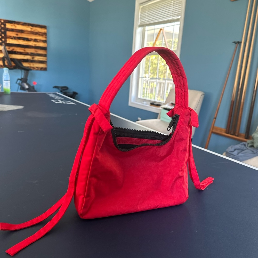 Sandy Liang x Baggu bow bag in Candy Apple red.